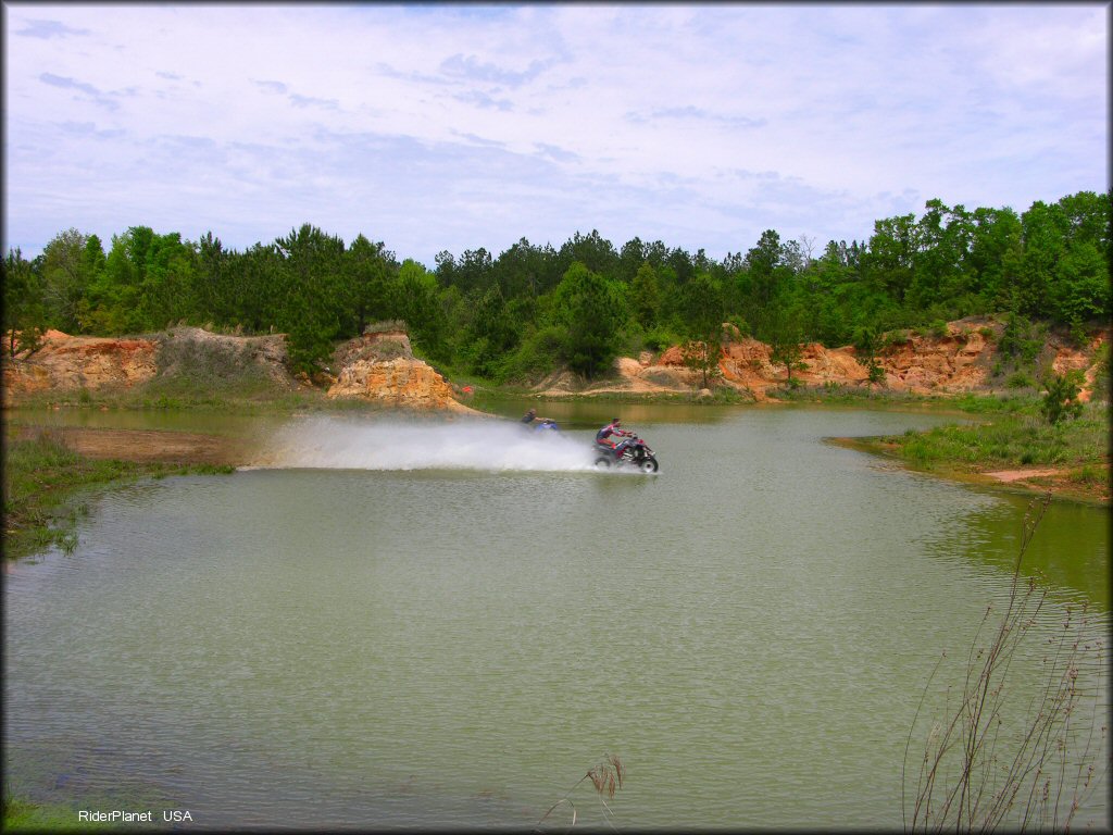 ATV in the water at Sand Hill ATV OHV Area