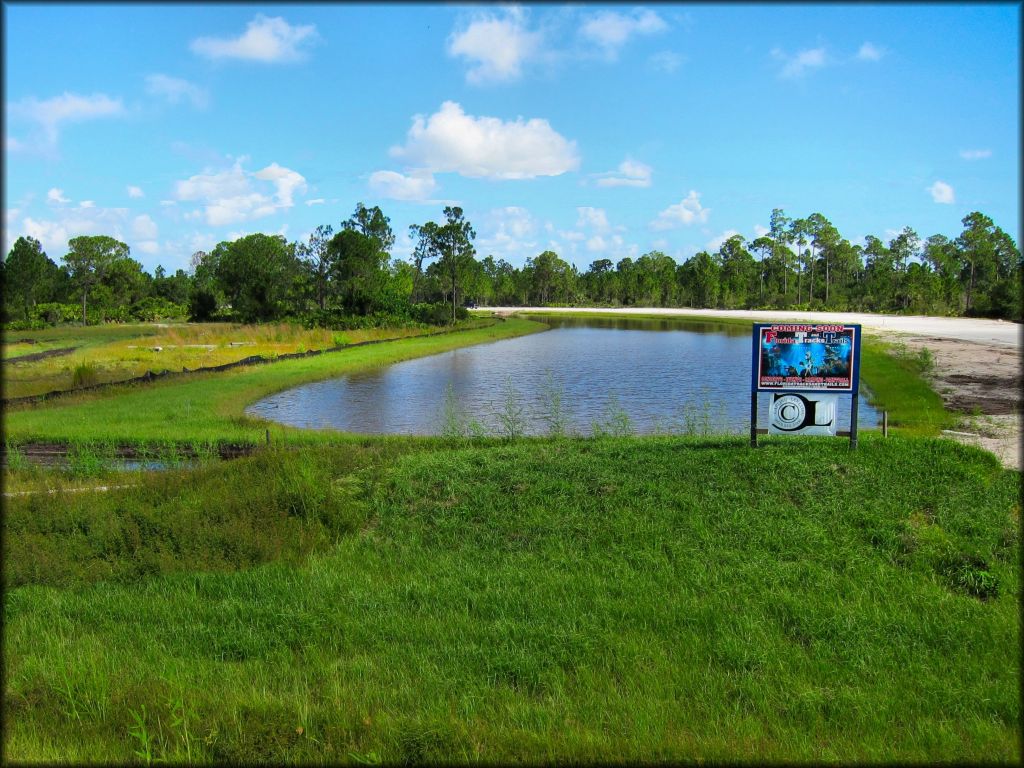 Signage for Florida Tracks and Trails seen from main entrance road.