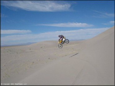 OHV catching some air at Tonopah Dunes Dune Area
