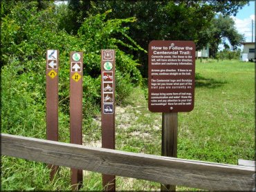 Brown carsonite trail posts.