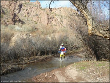 OHV in the water at Panaca Trails OHV Area