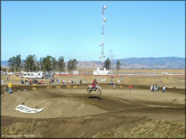 Honda CRF Motorcycle jumping at Argyll MX Park Track