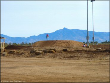 Dirt Bike jumping at M.C. Motorsports Park Track
