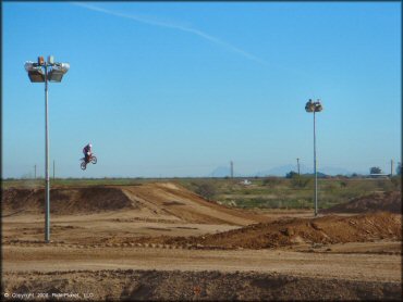 Honda CRF Trail Bike jumping at Motogrande MX Track