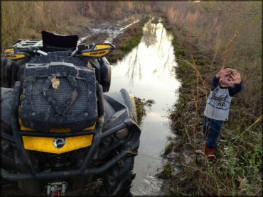 OHV crossing some water at Up The Creek Acres Trail