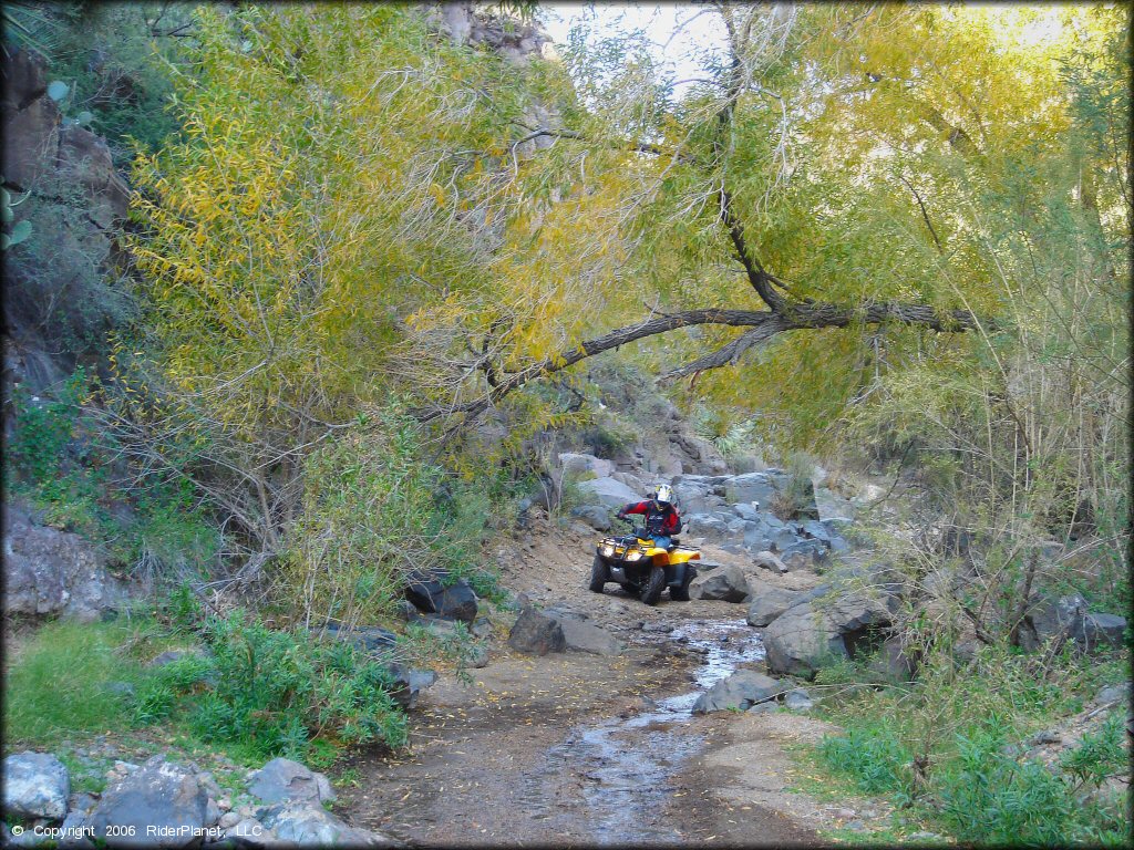 OHV traversing the water at Log Corral Canyon Trail