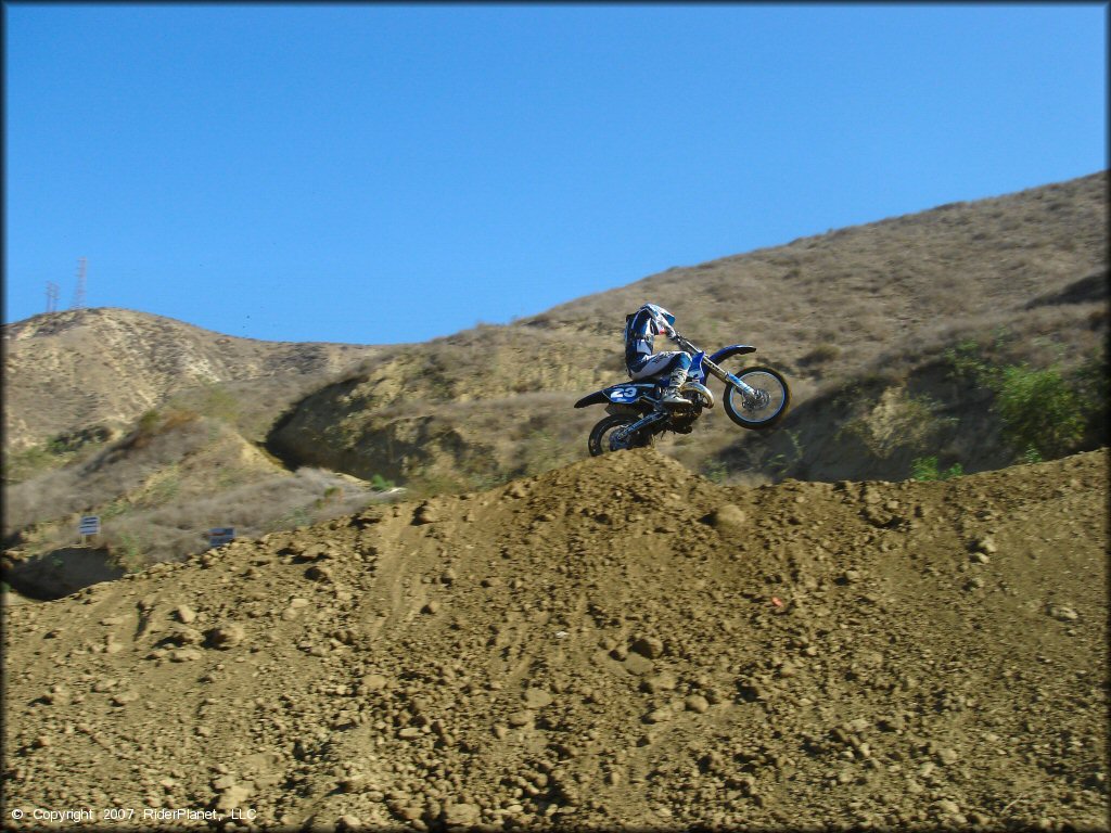 Yamaha YZ Dirt Bike jumping at MX-126 Track