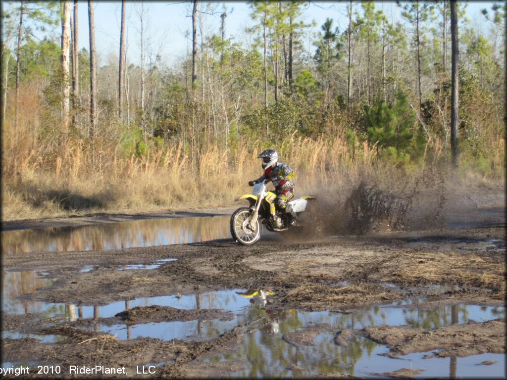 OHV crossing some water at Big Nasty ATV Park OHV Area