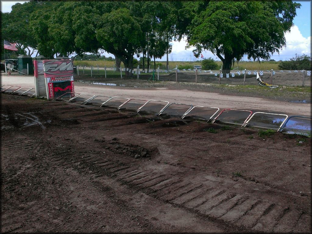 Motocross starting gate with FM and Matrix banners.