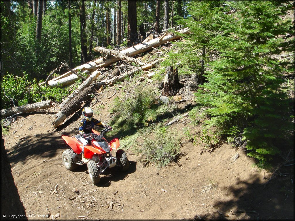 Female rider on a Honda Four Wheeler at South Camp Peak Loop Trail