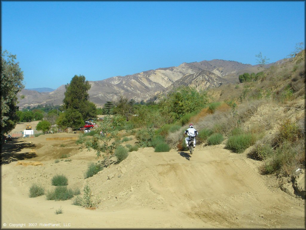 Trail Bike jumping at MX-126 Track