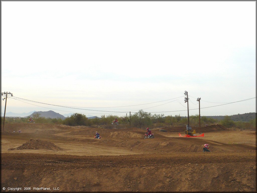 Motorcycle getting air at Canyon Motocross OHV Area