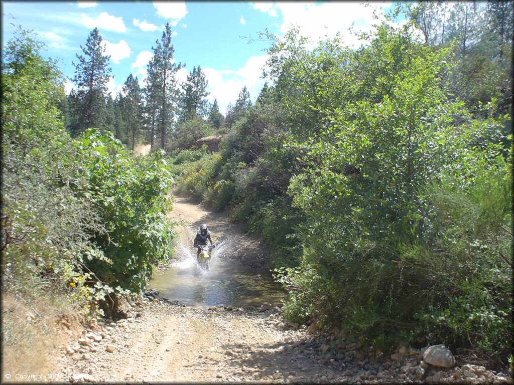 OHV traversing the water at Chappie-Shasta OHV Area Trail