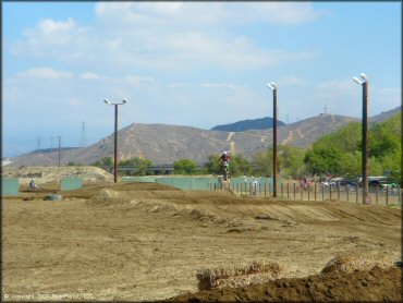 Kawasaki KX Off-Road Bike jumping at Milestone Ranch MX Park Track