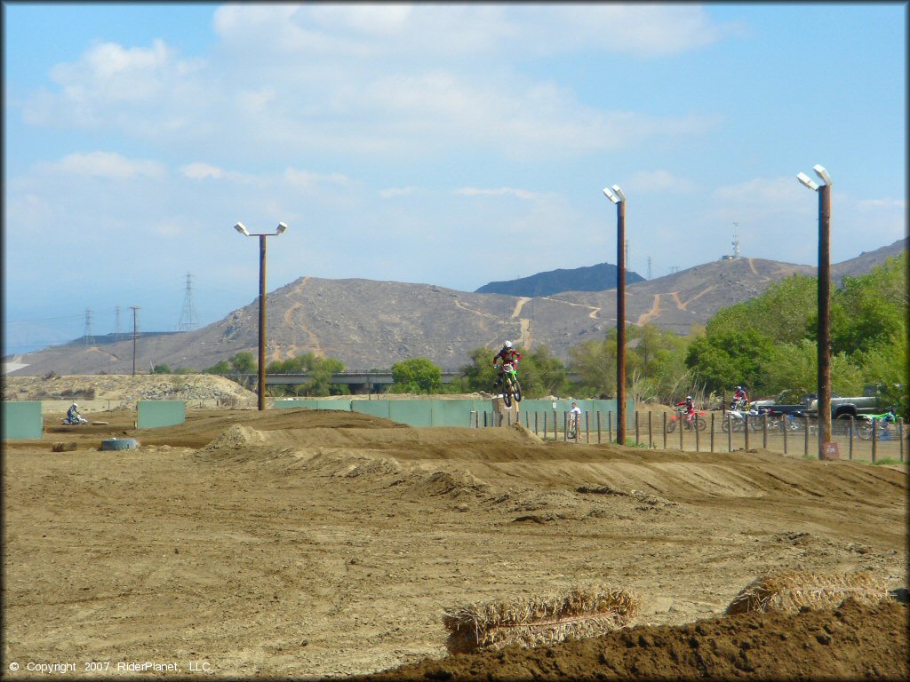 Kawasaki KX Dirt Bike jumping at Milestone Ranch MX Park Track