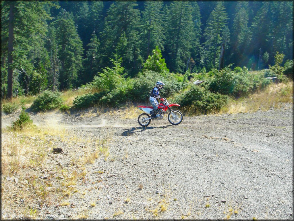 Woman on a Honda CRF Off-Road Bike at Pilot Creek OHV Trails