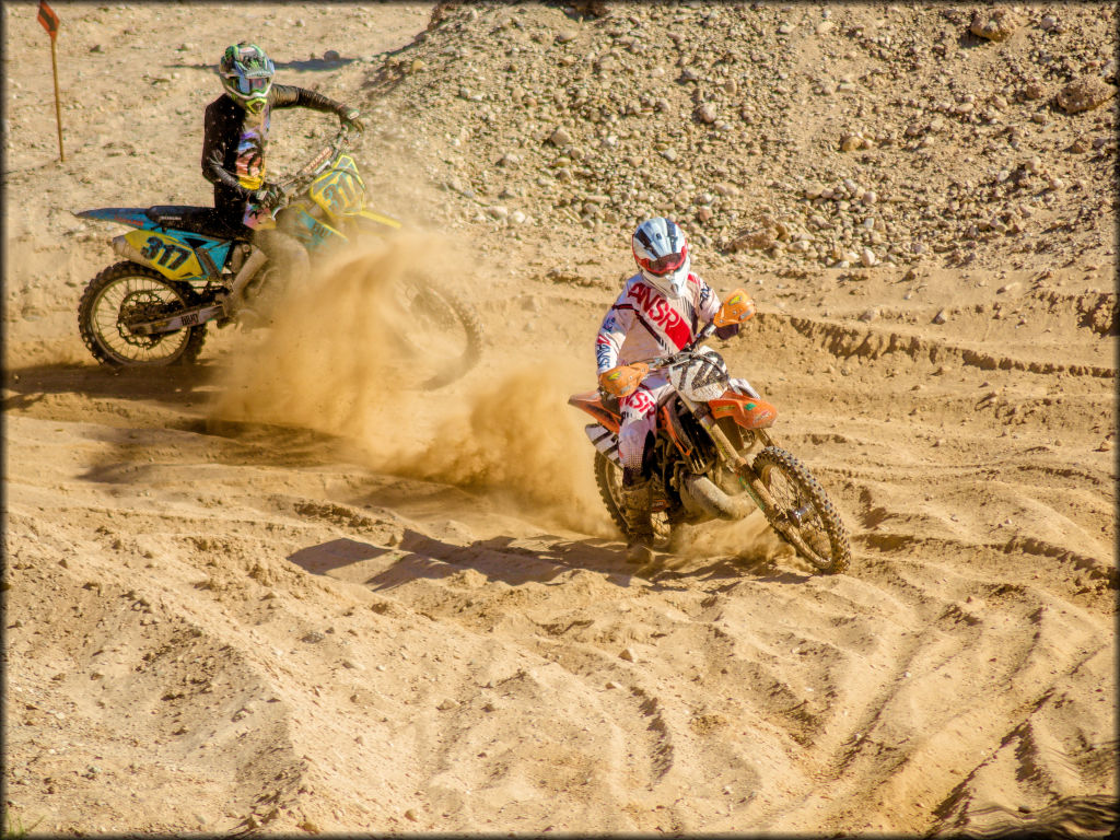 Weston Atwater roosts his brother Jarren in the sand corner