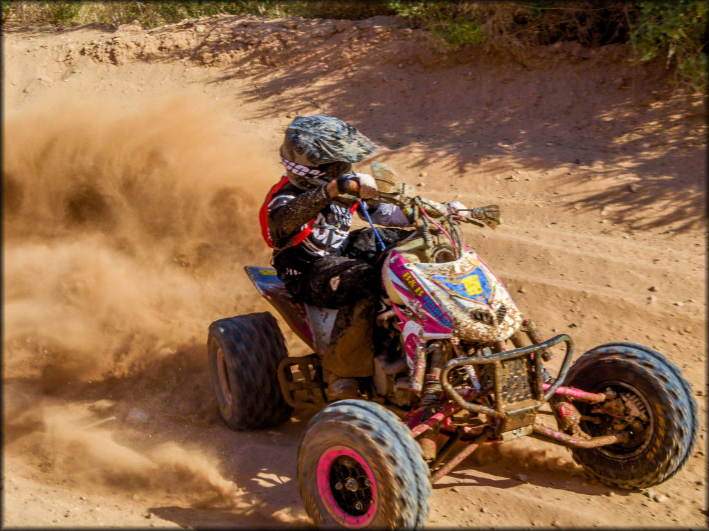 Andrew Simmons slides through the sand corner at crazy Horse