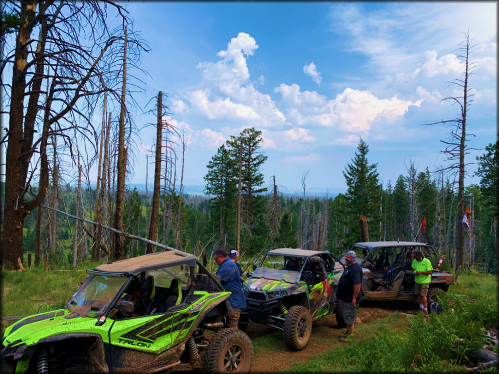 Many UTVs on Mountain Trail