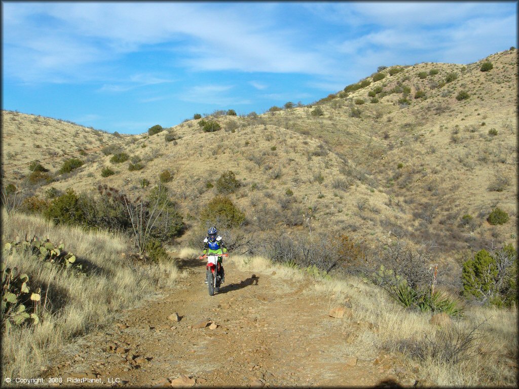 Female rider on a Honda CRF Dirtbike at Santa Rita OHV Routes Trail