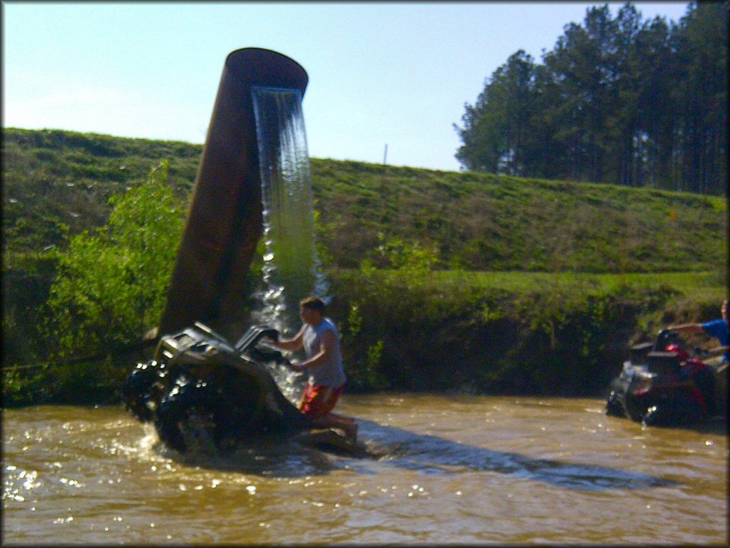 OHV traversing the water at Boggs and Boulders Trail