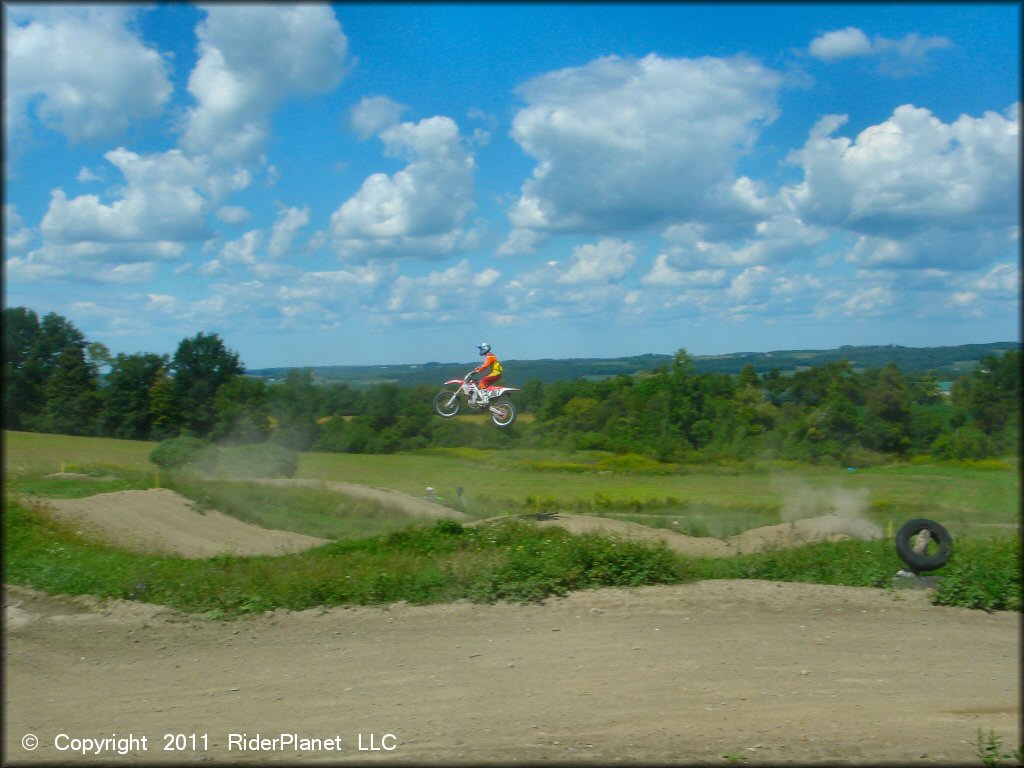 Honda CRF Dirtbike jumping at Frozen Ocean Motorsports Complex Track