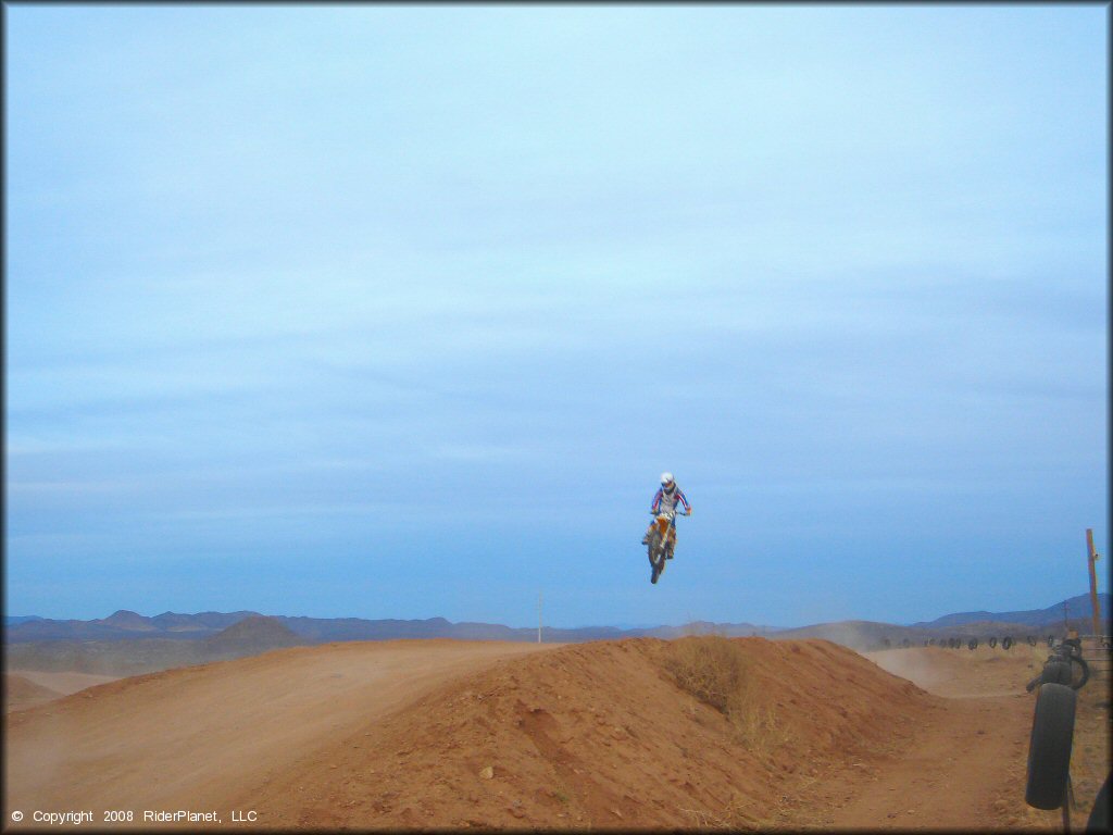 Off-Road Bike getting air at Nomads MX Track OHV Area