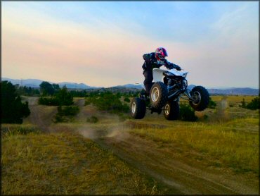 An ATV Jumping On A Track