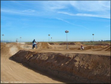 Yamaha YZ Dirtbike getting air at Motogrande MX Track