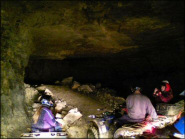 Three ATVs in underground lime mine.