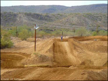 Dirt Bike catching some air at Canyon Motocross OHV Area