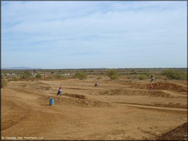 Motorcycle catching some air at Canyon Motocross OHV Area