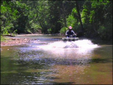 OHV crossing the water at Camp Gruber ORV Area Trail