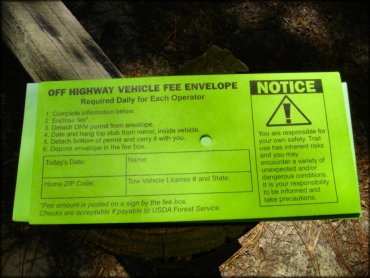 A close up photo of the Ocala National Forest OHV Fee Envelope.