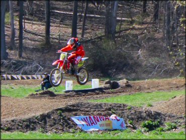 OHV getting air at Echo Valley Farm Motocross Track