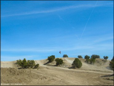 Trail Bike catching some air at Stead MX OHV Area