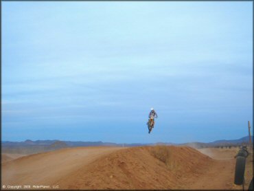 Motorbike catching some air at Nomads MX Track OHV Area