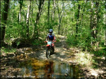 OHV crossing some water at Wrentham Trails