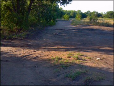 A trail at The River ATV Park Trail