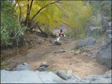 OHV traversing the water at Log Corral Canyon Trail