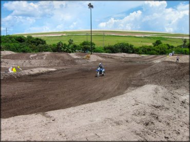 Yamaha dirt bike on motocross track.