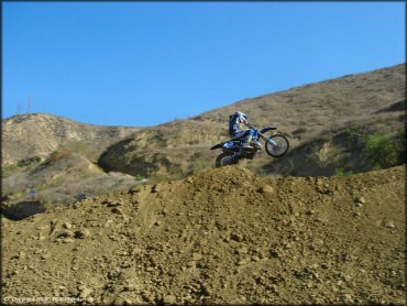 Yamaha YZ Dirt Bike jumping at MX-126 Track