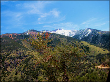 Scenic view of snow capped mountains.