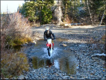 OHV traversing the water at Jackson Meadows Trail