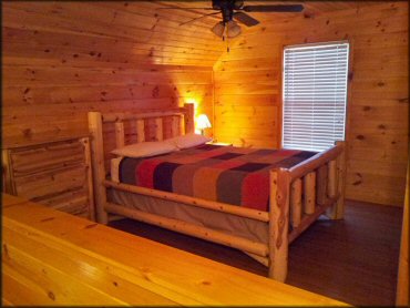 View of bedroom inside cabin.