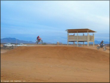 Honda CRF Motorcycle jumping at Nomads MX Track OHV Area