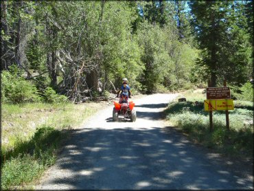 Female rider on a Honda ATV at South Camp Peak Loop Trail