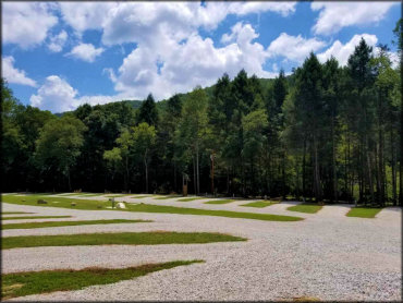 A view of the main area of the campground with gravel pull-through campsites for RVs.