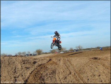 KTM Motorcycle catching some air at Motoland MX Park Track