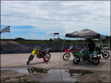 EZ-UP with four dirt bikes.